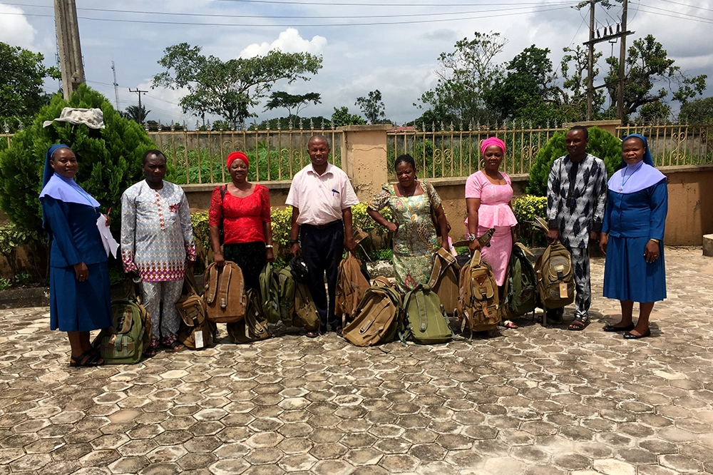 Donation of School Bags with Exercise Books Inside